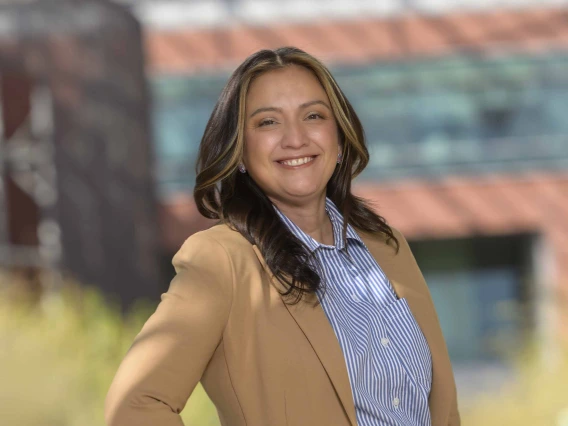 Portrait of Monique Peña standing outside