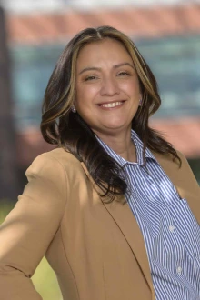 Portrait of Monique Peña standing outside